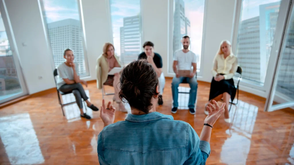 A-group-therapy-session-symbolizing-support-for-the-Challenges-of-Mental-Health-and-well-being
