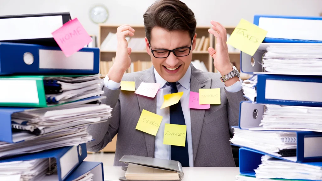 A-stressed-office-worker-surrounded-by-stacks-of-paperwork-and-sticky-notes-representing-the-silent-struggle-of-balancing-work-and-life-demands