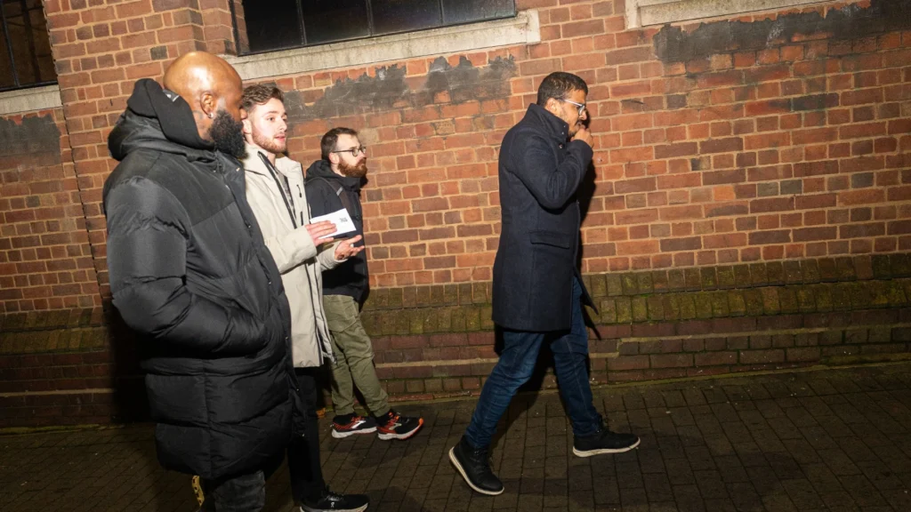 MPC-Walk-&-Talk-event-members-walking-together-at-night-taking-One-Step-at-a-Time-for-mental-wellbeing