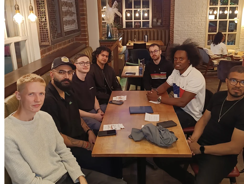 MPC-group-at-a-health-and-fitness-event-sitting-together-at-a-table