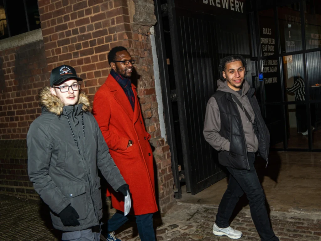 Three-people-walking-together-outdoors-during-season-2-session-4-of-MPC
