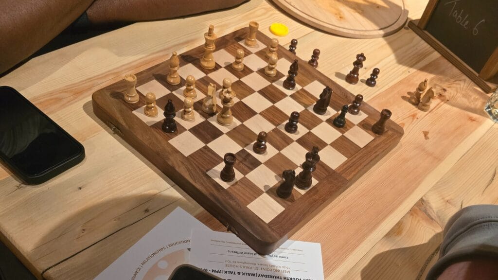 Chess-game-in-progress-at-MPC-event-with-focus-on-strategy-and-mental-exercise