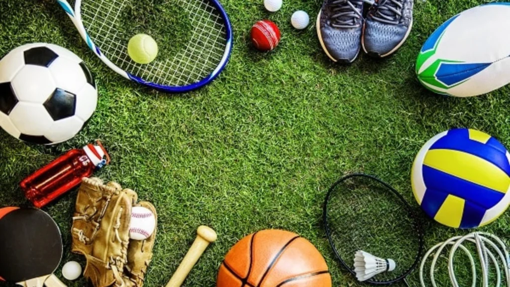 variety-of-sports-equipment-on-grass-representing-diverse-activities-and-the-benefits-of-sports-for-adults