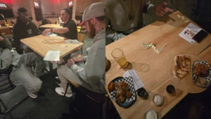 Guests-playing-dominoes-and-sharing-food-during-an-MPC-events-Social-Game-night-in-a-relaxed-indoor-setting