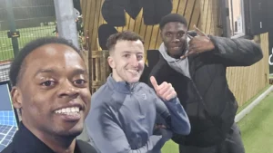 MPC-members-smiling-and-posing-for-a-selfie-outside-after-a-sporty-Walk-and-Talk-session-on-a-cool-evening