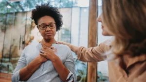 Two-women-showing-support-in-a-workplace-community-setting
