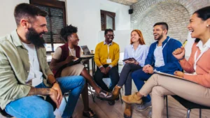 workplace-community-laughing-and-engaging-in-a-casual-meeting