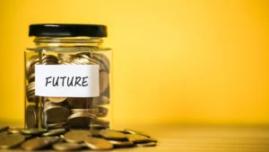 Jar-labeled-FUTURE-filled-with-coins-Building-savings-as-part-of-money-mindset-for-men-in-their-20s