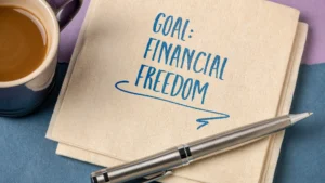 Notebook-with-Goal-Financial-Freedom-message-symbolizing-Good-Money-Habits