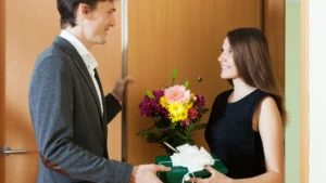 A-man-delivering-flowers-as-an-apology-highlighting-Apology-Languages-in-action