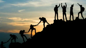 A-group-of-people-helping-each-other-to-reach-new-heights-symbolizing-faith-in-trust-and-relationships
