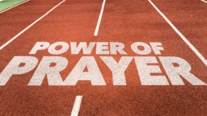 Power-of-Prayer-written-on-a-track-field-symbolizing-strength-and-faith