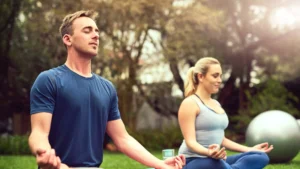 Two-people-meditating-outdoors-embracing-the-Power-of-Prayer-and-mindfulness