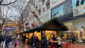 Festive-events-at-a-Christmas-market-with-holiday-decorations-and-a-crowd
