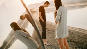 A-man-and-woman-walking-in-different-directions-reflecting-the-emotional-distance-after-a-breakup-and-its-impact-on-Mens-Mental-Health