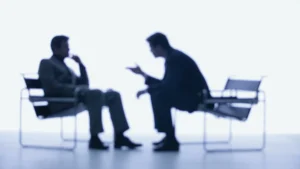 Men-engaging-in-conversation-representing-Mens-Health-Strategy-focus-on-communication