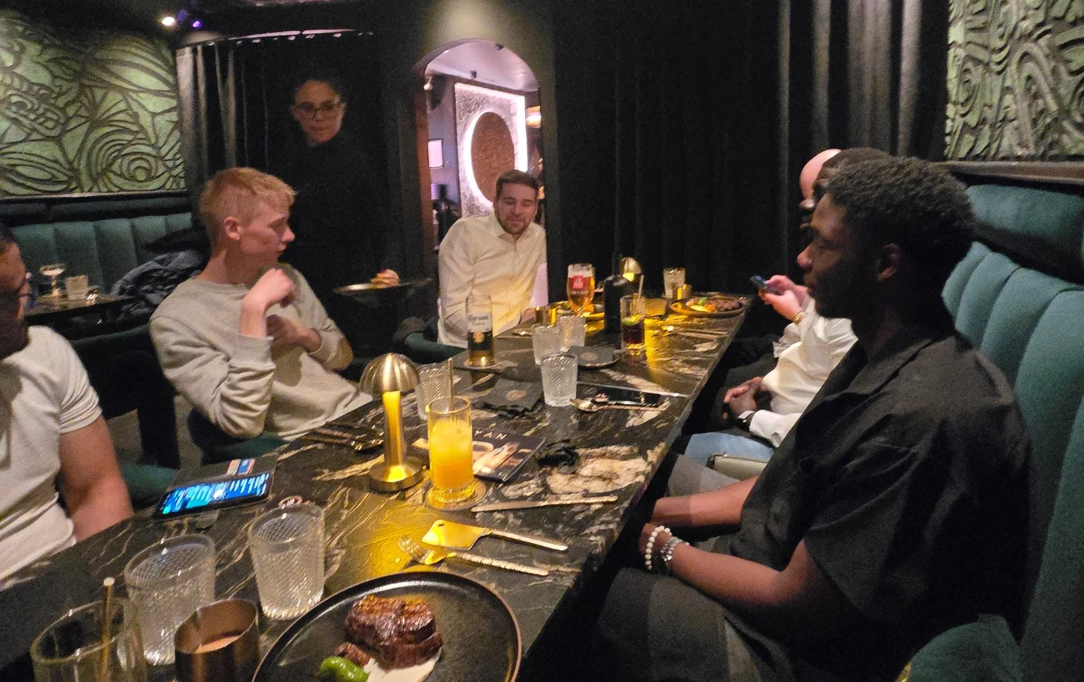 End-of-Season-Dinner-conversation-at-the-table