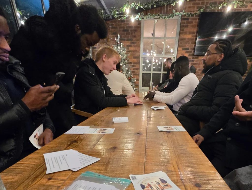 Men’s-Prosperity-Club-attendees-participating-in-a-discussion-on-mental-health-and-personal-development-at-the-event